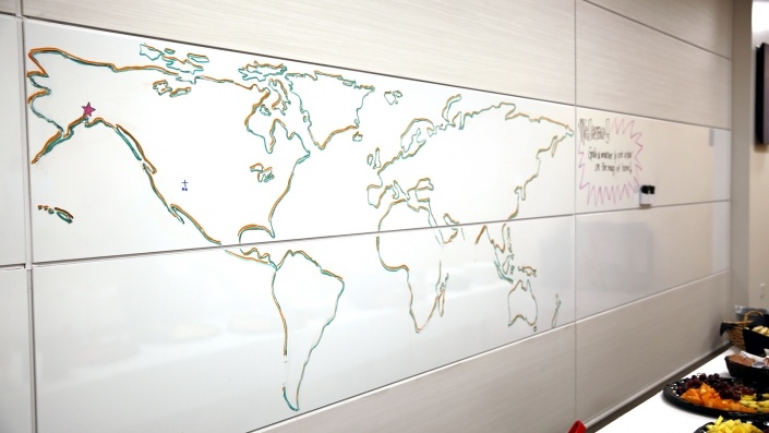 World map drawn on whiteboards