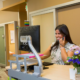 Employee at desk answering the phone