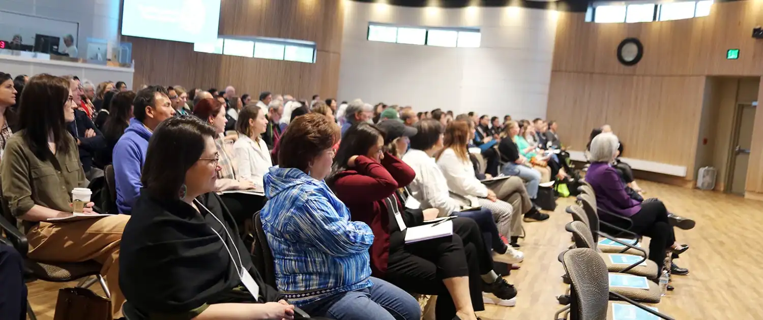 Nuka Conference attendees listening to a presentation
