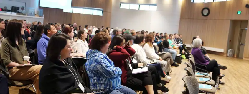 Nuka Conference attendees listening to a presentation