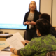 participants in ASTP listening to a presentations
