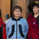 Three women in traditional Alaska Native clothing