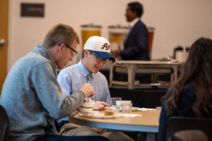 Conference attendees enjoying breakfast