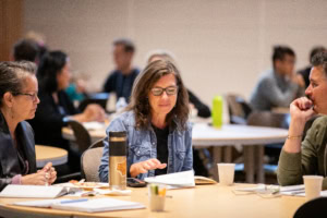 Conference attendees working