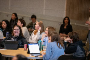 Conference attendees working