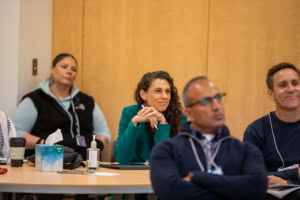 Conference attendees listening