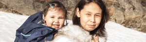 Inuit Mother and Daughter on Baffin Island, Nunavut, Canada.